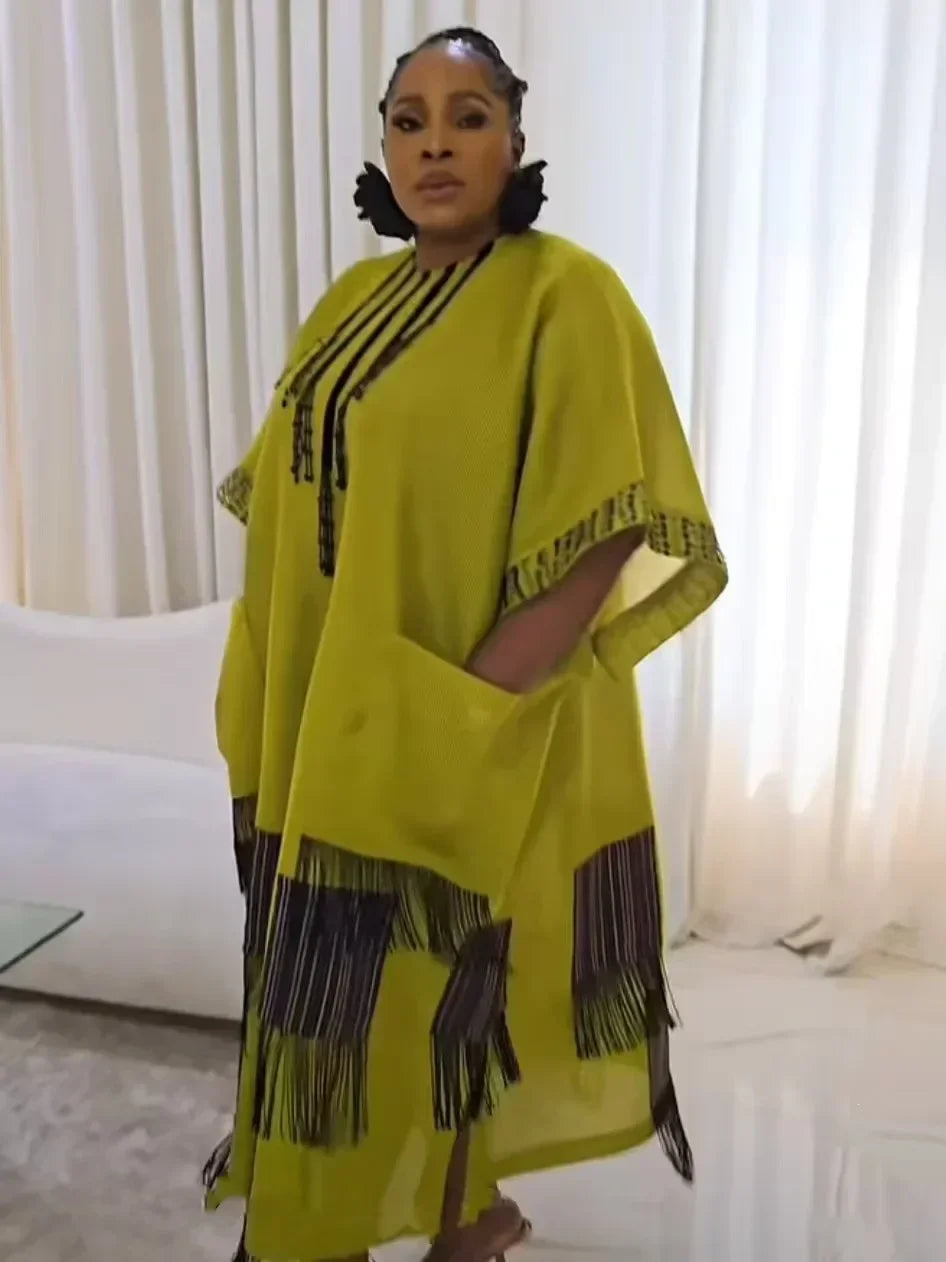 Elegant plus size African dress for women, featuring a fashionable half sleeve and o-neck design, crafted from high-quality polyester.