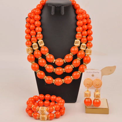 Complete Nigerian bridal jewelry set displayed elegantly with necklace, bracelet, and earrings, perfect for brides seeking fashion-forward luxury.