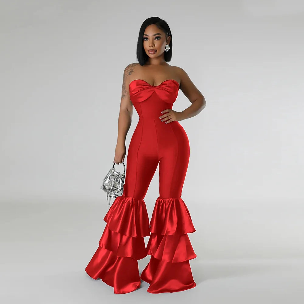 Chic detail of the mid-waist design on a women's sleek jumpsuit, highlighting its refined silhouette tailored for a posh lifestyle.