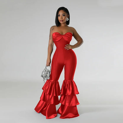 Chic detail of the mid-waist design on a women's sleek jumpsuit, highlighting its refined silhouette tailored for a posh lifestyle.