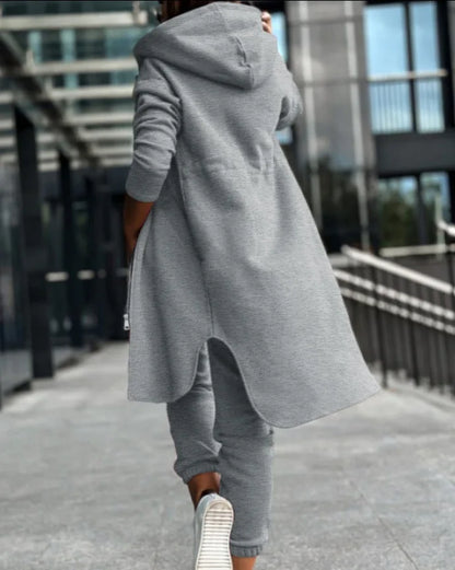 Luxury women's hooded zipper long coat tracksuit in a sophisticated style, featuring ankle-length pants for an elegant office look.