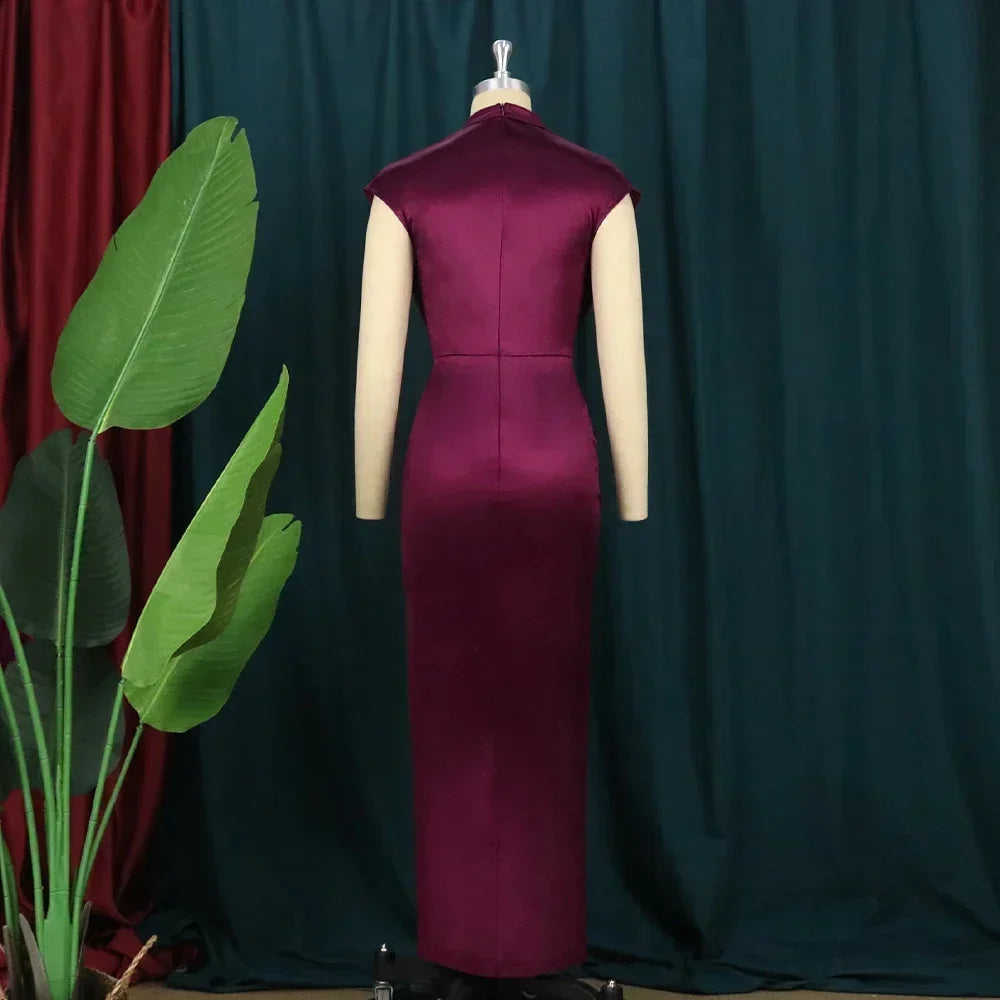 Stylish Burgundy Bodycon Dress with feminine details, ideal for plus size women seeking elegance in formal occasions.