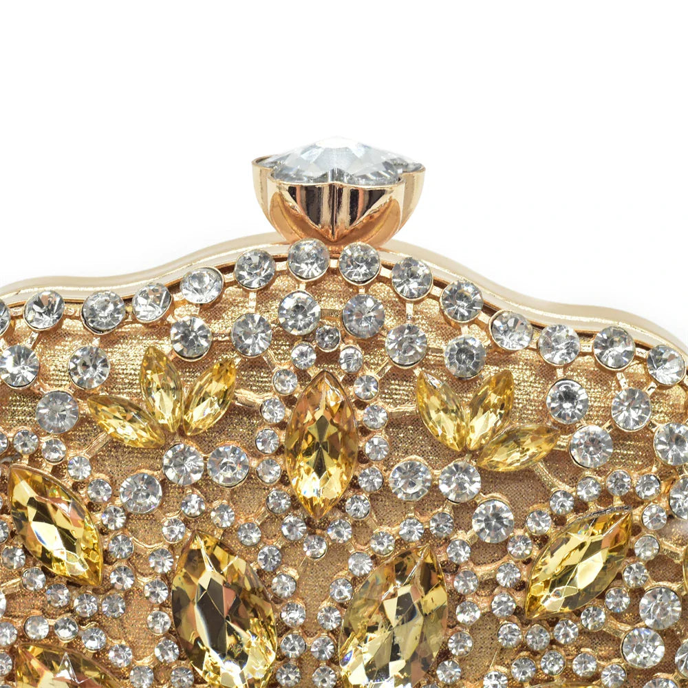 High-heel peep-toe pumps in black, featuring stylish metal decoration, elegantly matched with a designer handbag.