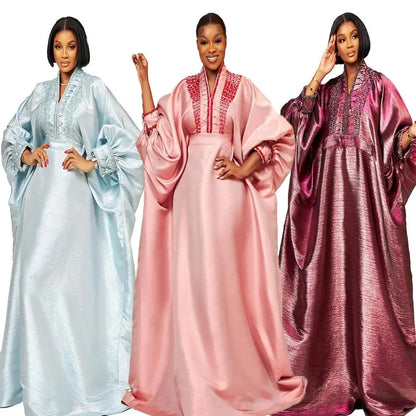 Elegant V-neck dress adorned with rhinestones, perfect for women attending African church events, embodying style and cultural significance.