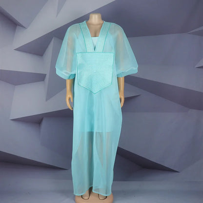 Chic African modern design dress for plus size women, detailed with mesh and embroidery for a luxurious appeal.