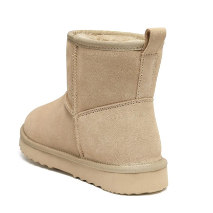 Chic women's fashionable snow boots with low square heels, perfect for an office lady's winter wardrobe.