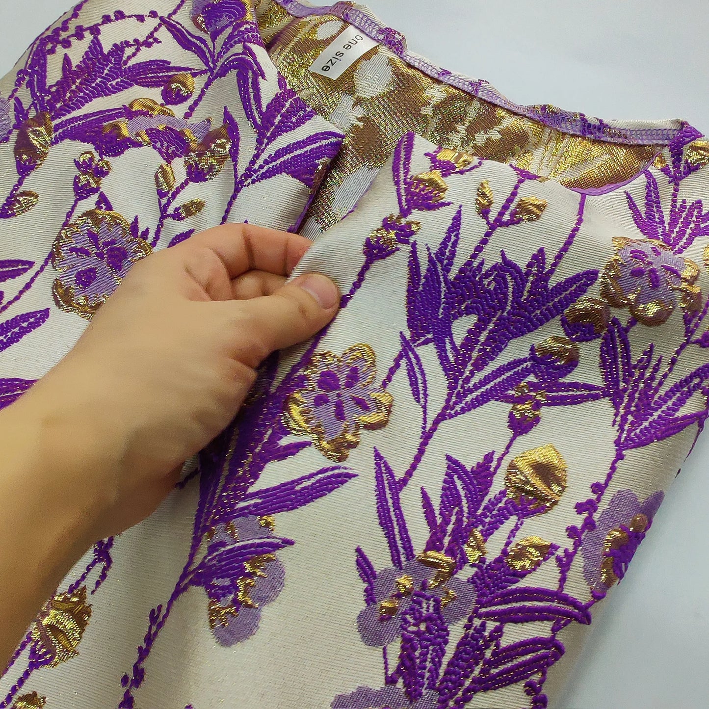 Close-up view showcasing intricate brocade and bazin details of the Luxury African Women's Dashiki Dress.