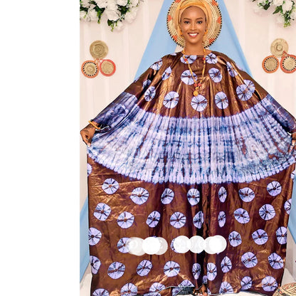 Detail of the luxurious cotton fabric of the African Dashiki Bubu Dress, emphasising comfort and style with a vibrant blue colour.