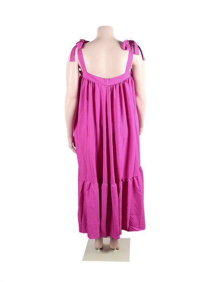 Elegant Wmstar Plus Size Maxi Dress in solid black, showcasing a luxurious ankle-length slip design perfect for summer parties.