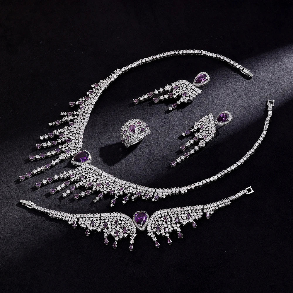 Luxury 4-piece bridal wedding jewelry set featuring elegant cubic zirconia stones in a geometric design, perfect for stylish brides.