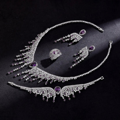 Luxury 4-piece bridal wedding jewelry set featuring elegant cubic zirconia stones in a geometric design, perfect for stylish brides.