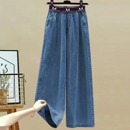 Back view of the luxury women's plus size summer two-piece set, highlighting the stylish contours and craftsmanship of the shirt and pants ensemble.