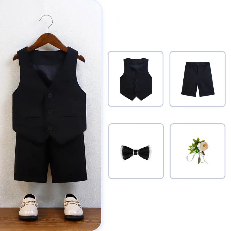 Chic luxury boys baptism ensemble featuring a green and white suit set with a stylish vest, shirt, shorts, and bowtie, suitable for ages 7-13.