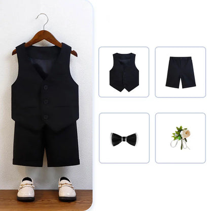 Chic luxury boys baptism ensemble featuring a green and white suit set with a stylish vest, shirt, shorts, and bowtie, suitable for ages 7-13.
