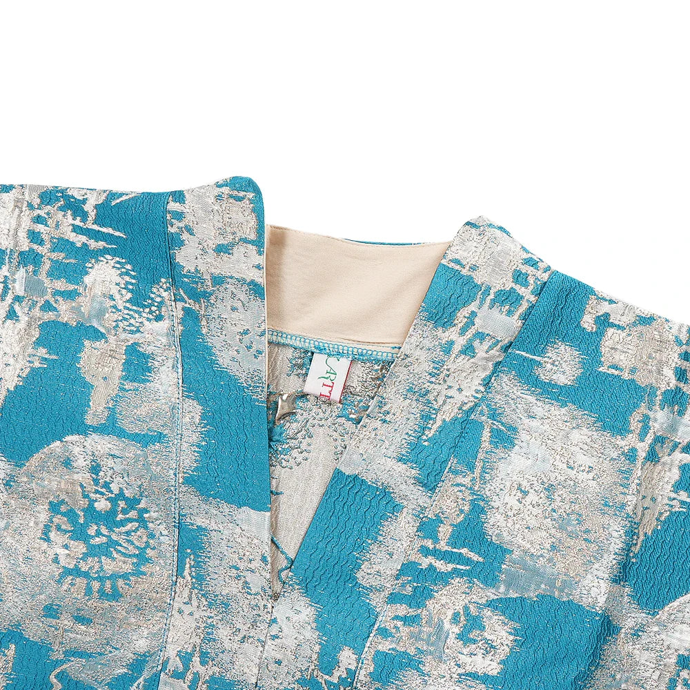 Elegant African traditional Dashiki dress for women in vibrant colours, showcasing intricate patterns and high-quality fabric, perfect for special occasions.