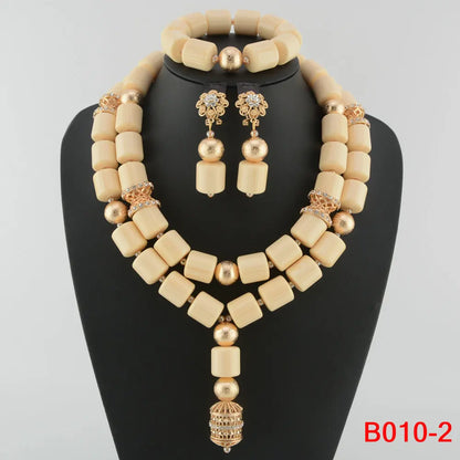 Elegant African wedding jewelry set featuring stunning resin beads, including necklace, earrings, and bracelet for women, showcasing classic design and upscale style.