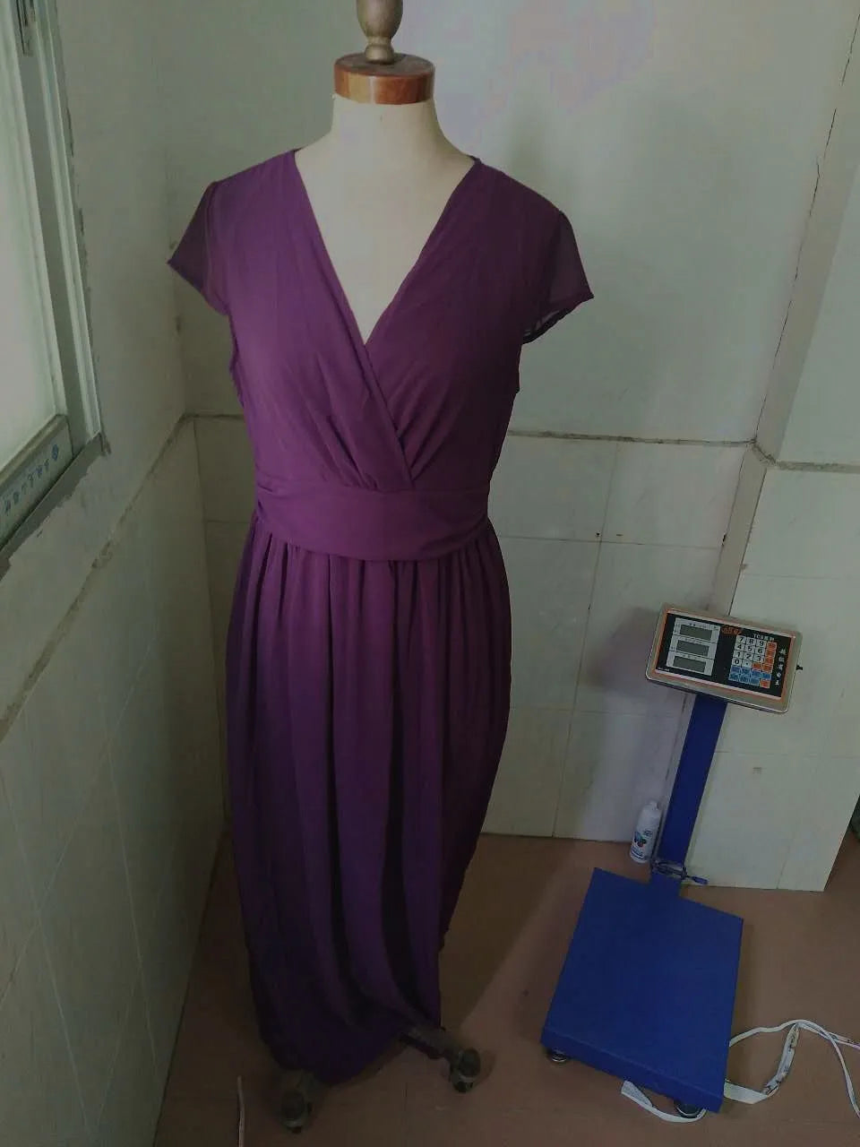 Stylish slim fit women's dress with a solid pattern and elegant A-line silhouette, ideal for both casual and formal settings.