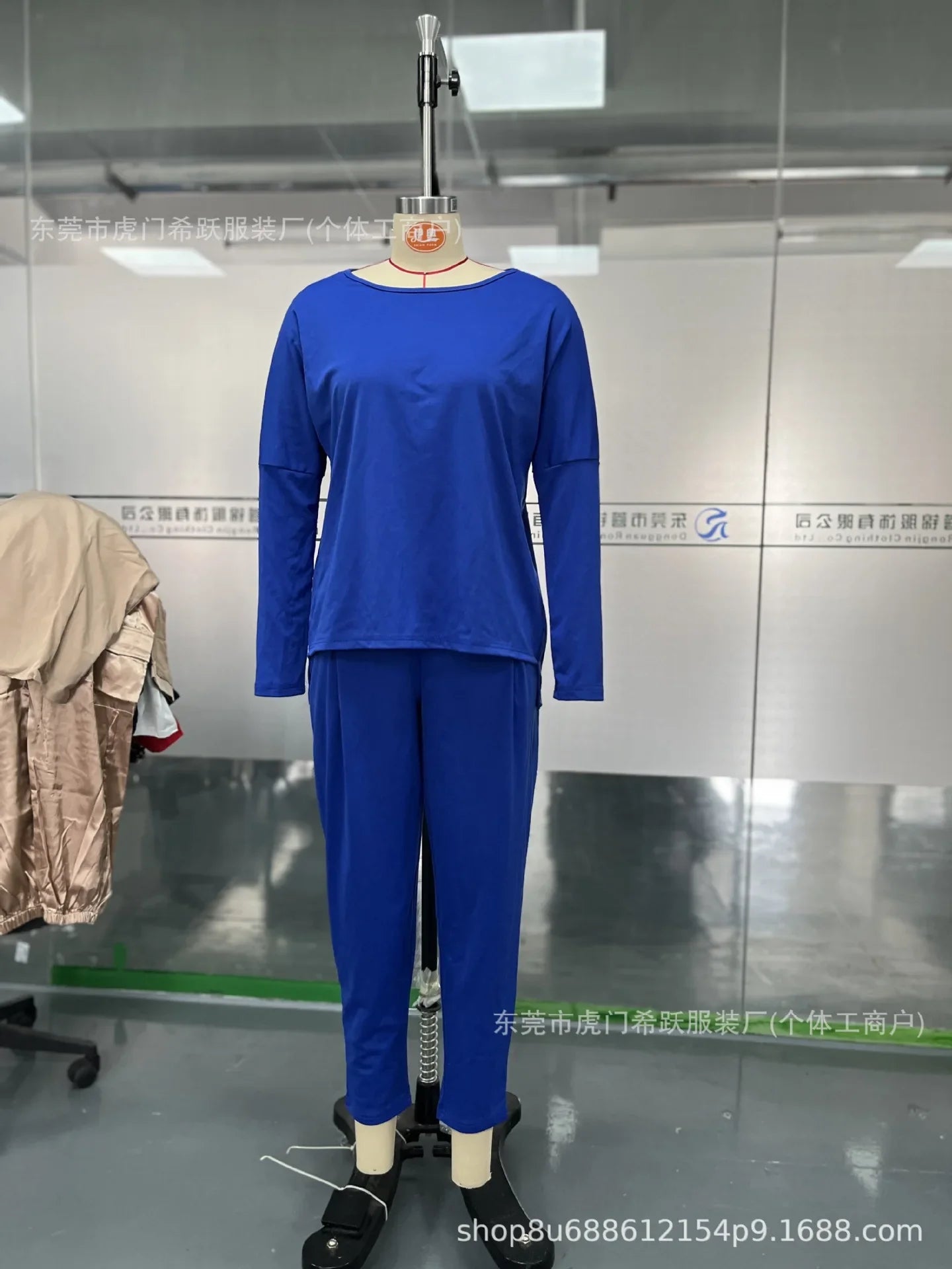 Fashionable flat lay arrangement of the elegant women's two-piece set, showcasing its stylish pockets, full sleeve design, and luxurious aesthetic suitable for various occasions.