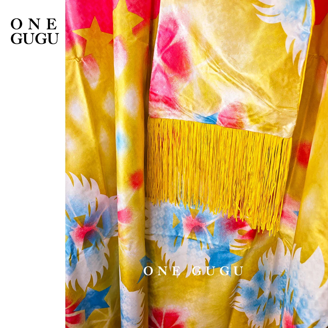 Stylish presentation of the luxurious blue Bazin Riche African Dashiki wedding dress, tailored for elegance and comfort in festive occasions.