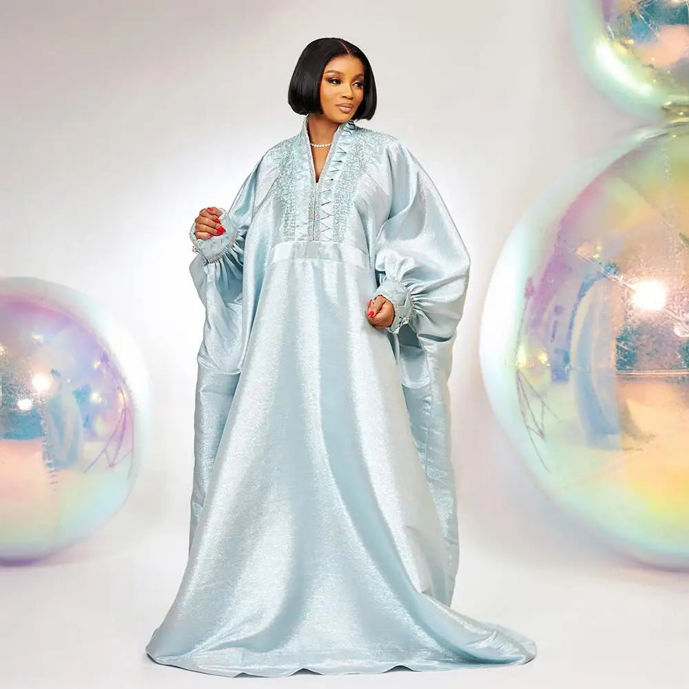 Full view of the Luxury Elegant V-Neck Rhinestone Turkey Dress on a model, epitomizing sophistication and African cultural fashion.