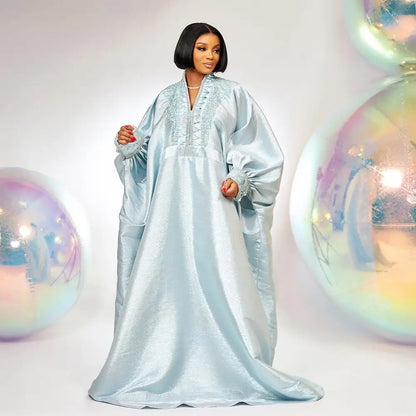 Full view of the Luxury Elegant V-Neck Rhinestone Turkey Dress on a model, epitomizing sophistication and African cultural fashion.