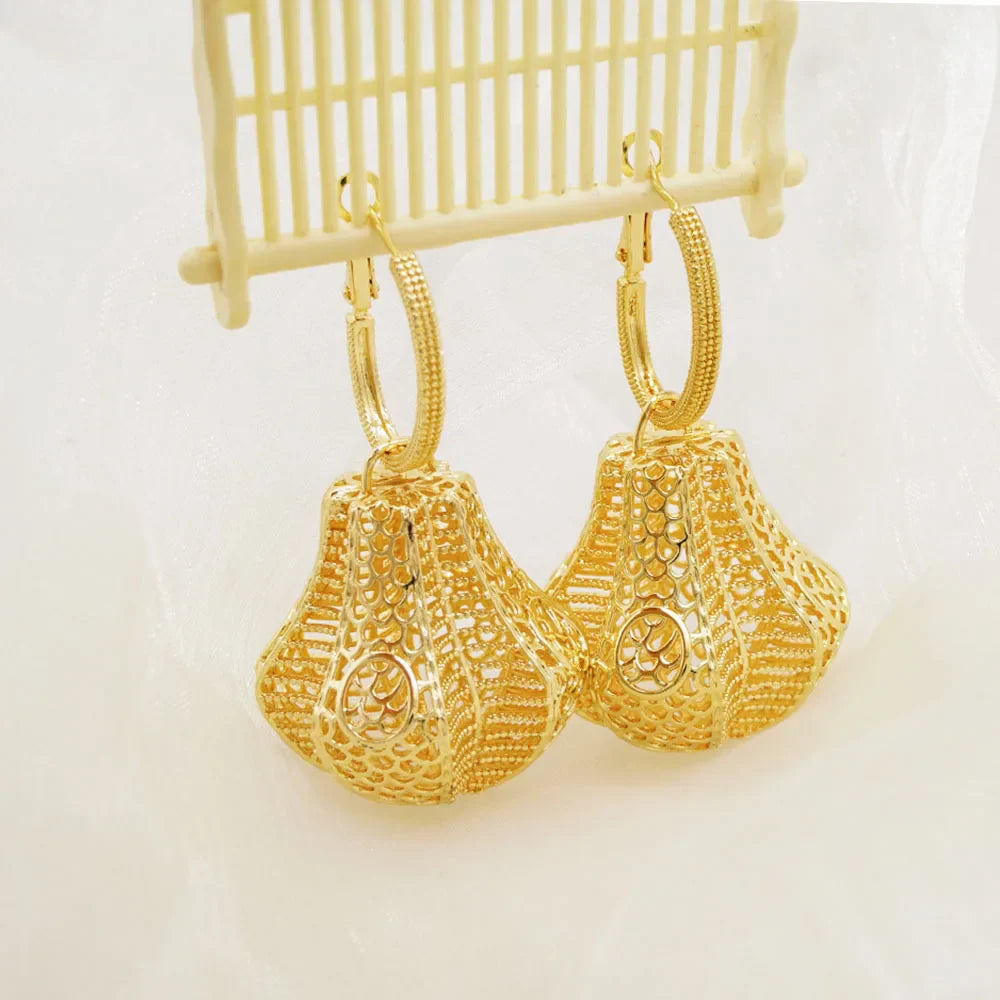 Close-up view of the long tassel earrings, showcasing intricate metal craftsmanship and trendy bohemian style for fashionable women.