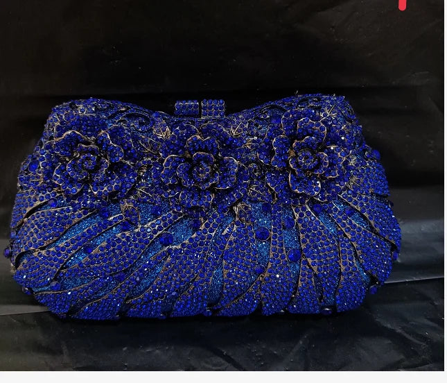 Luxury minaudiere clutch bag in metallic style for women, offering elegance and refinement for evening wear.