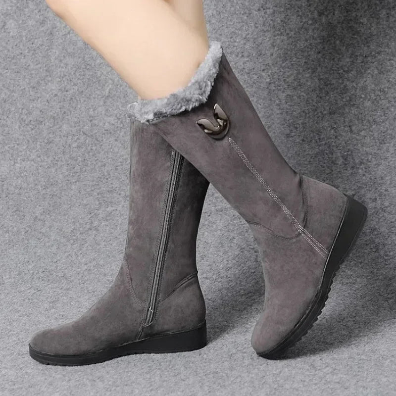 Elegant high fur chunky mid-calf boots with a flat heel, perfect for pairing with any winter outfit for a luxurious look.