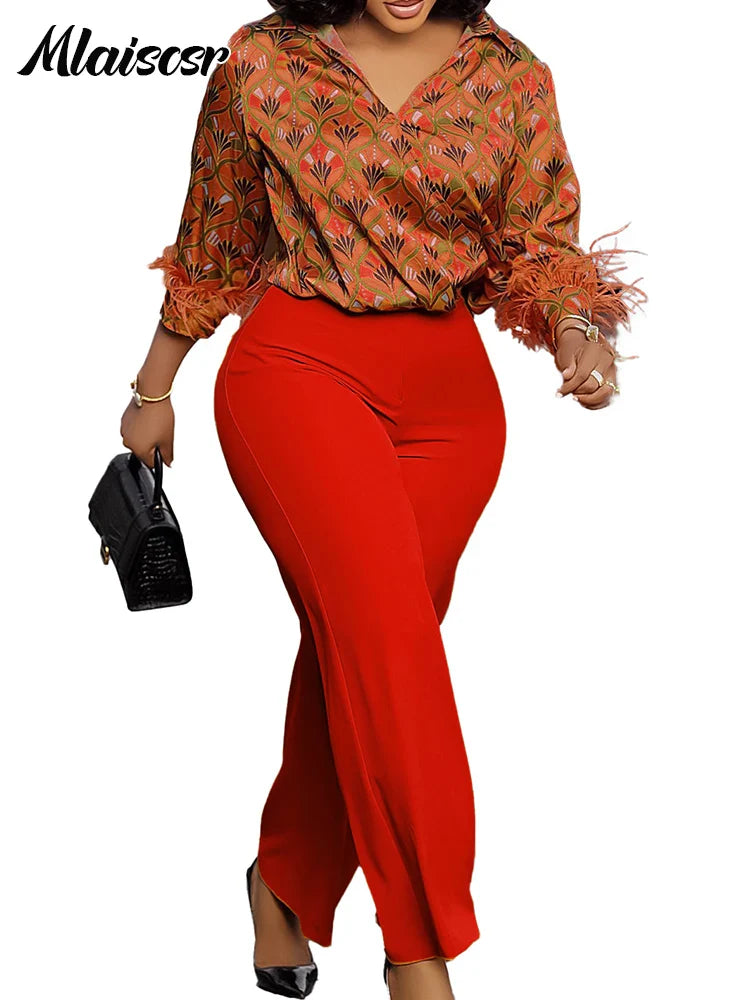 Close-up of the exquisite feather print detail on the Mlaiscsr long sleeve top, showcasing luxury craftsmanship and unique design for discerning women.