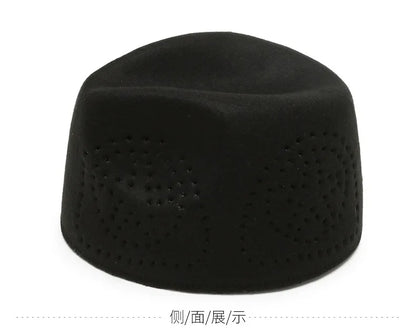 Elegant green Eid prayer cap with geometric designs for men, perfect for formal occasions.