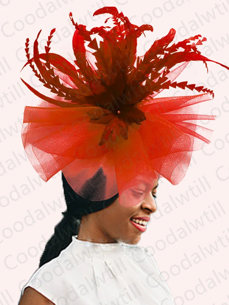 Sleek, fashionable feather pillbox cap fascinator for women, embodying elegance and luxury for special occasions like weddings and royal gatherings.