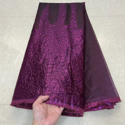 Luxury Nigerian Tulle Lace Fabric with intricate embroidery, perfect for bridal gowns, featuring a high-quality finish tailored for elegance.