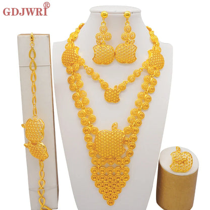 Complete luxury jewelry set for women featuring gold colour necklace, earrings, bracelet, and ring with African design elements, perfect for elegant parties.