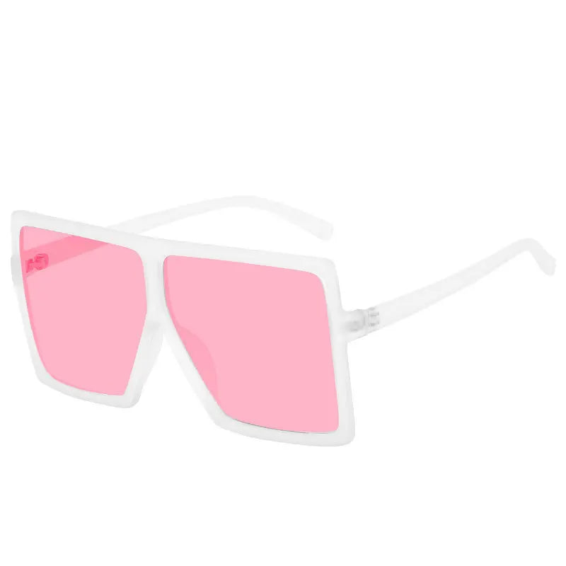 Stylish FenQiqi sunglasses on a fashion model, emphasizing the sophisticated square design and premium polycarbonate lenses.