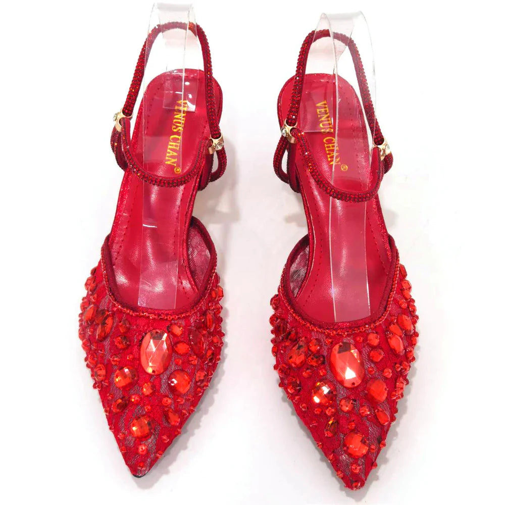 Stylish close-up of luxury ladies heel shoes showcasing the bling fashion element and premium synthetic flash material for an upscale look.