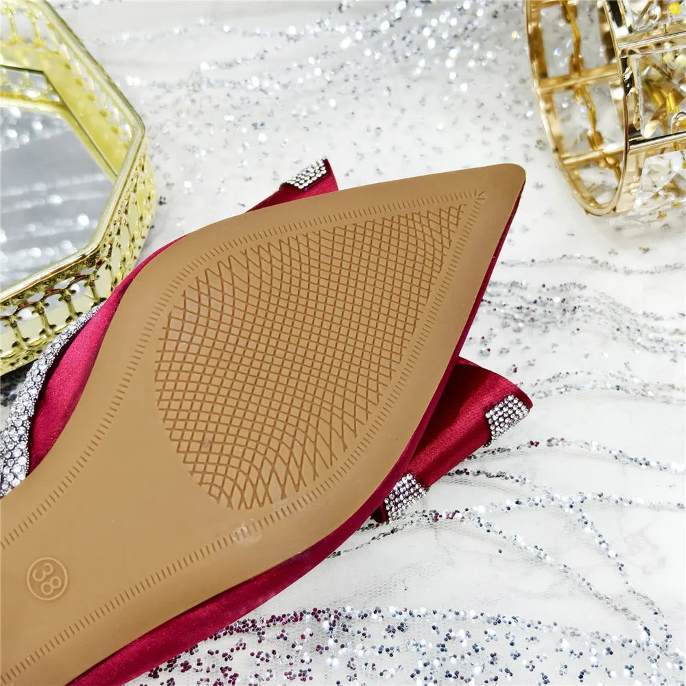 Elegant high-heeled African party sandals with crystal chain decoration for women, showcasing luxurious peep toe design and exquisite craftsmanship.