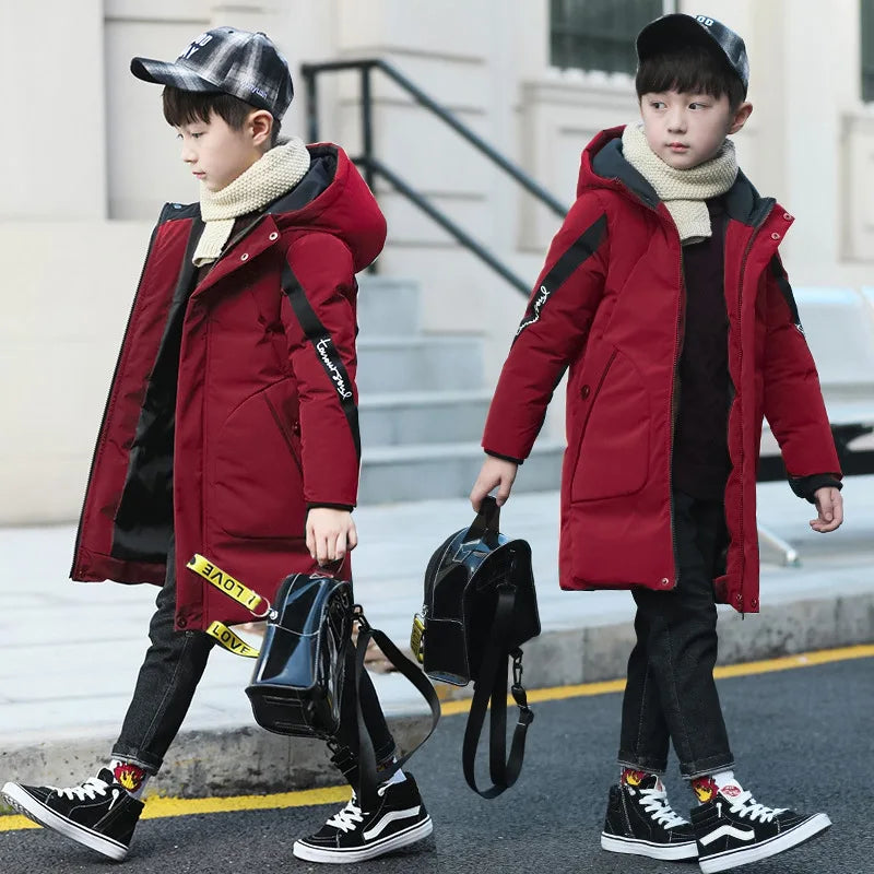 Elegant boys winter coat in camouflage design, featuring high-quality down cotton material and a stylish hood, ideal for keeping warm in luxury.