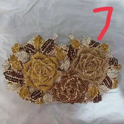 Luxurious metallic leather minaudière clutch evening purse with sparkling crystal embellishments, perfect for elegant parties.