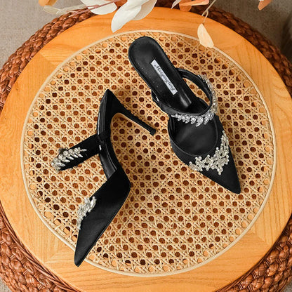 Beautifully crafted women's luxury low heel mules sandals with sparkling rhinestones, perfect for summer outings.