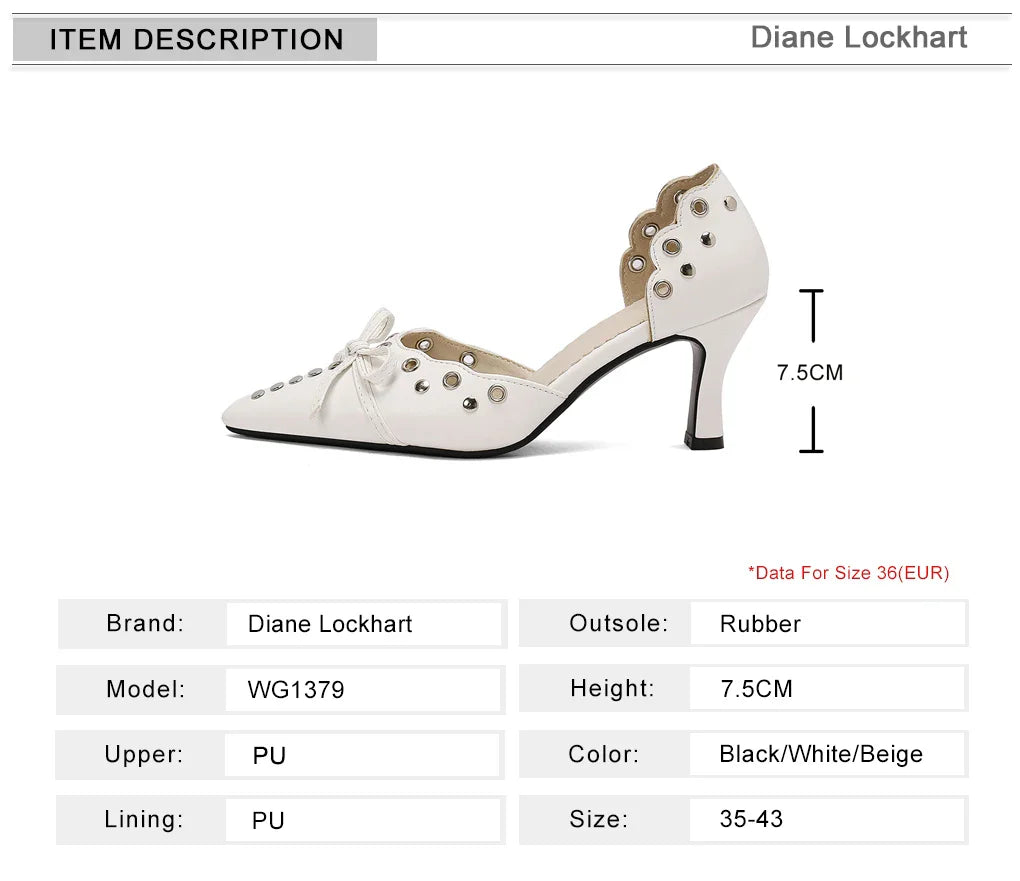 Close-up view of pointed toe pumps with air holes and distinctive metal decoration, ideal for upscale fashion.