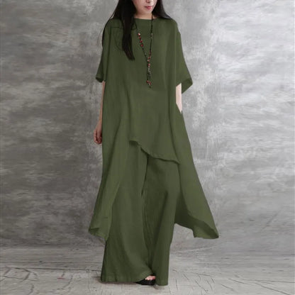 Full ensemble of women's luxury cotton linen 2-piece set laid out elegantly, featuring a casual loose blouse and fashionable trousers, perfect for summer occasions.