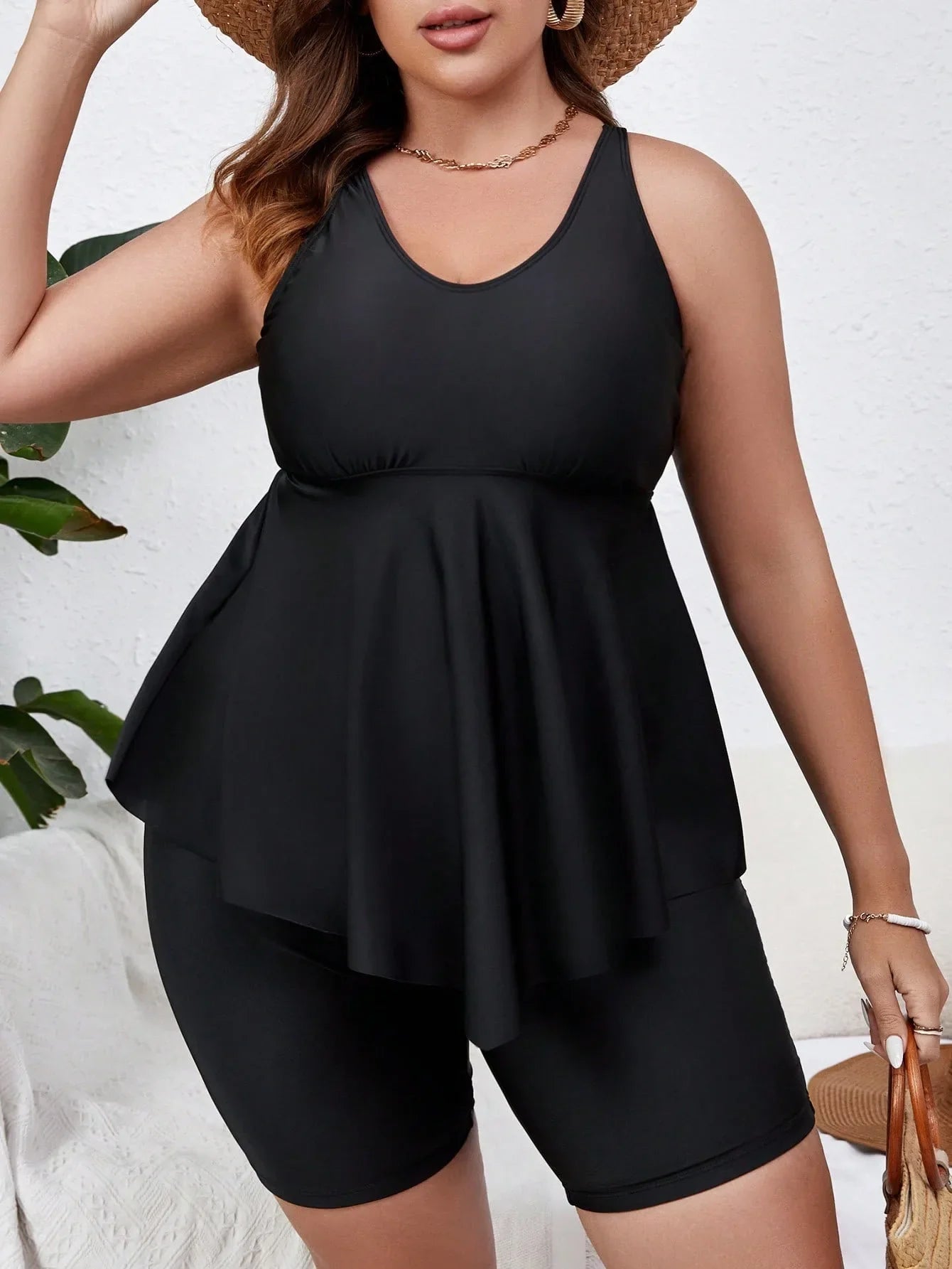 Valavalaki Plus Size Tankini swimwear beautifully captured, emphasizing its luxurious material and trendy design for a confident beach experience.