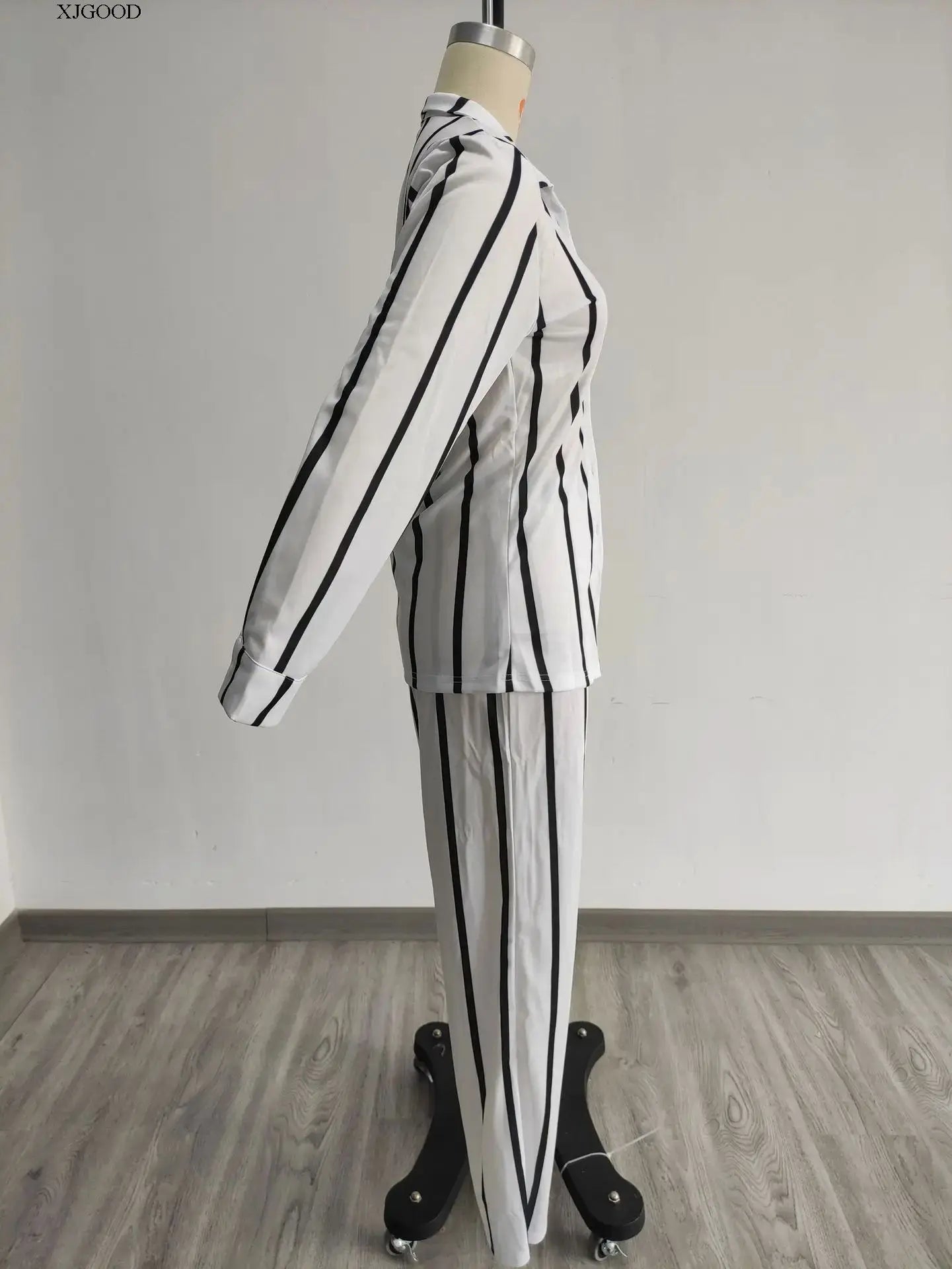 Stylish ensemble showcasing a women's luxe casual two-piece set, perfect for a chic yet comfortable outfit.