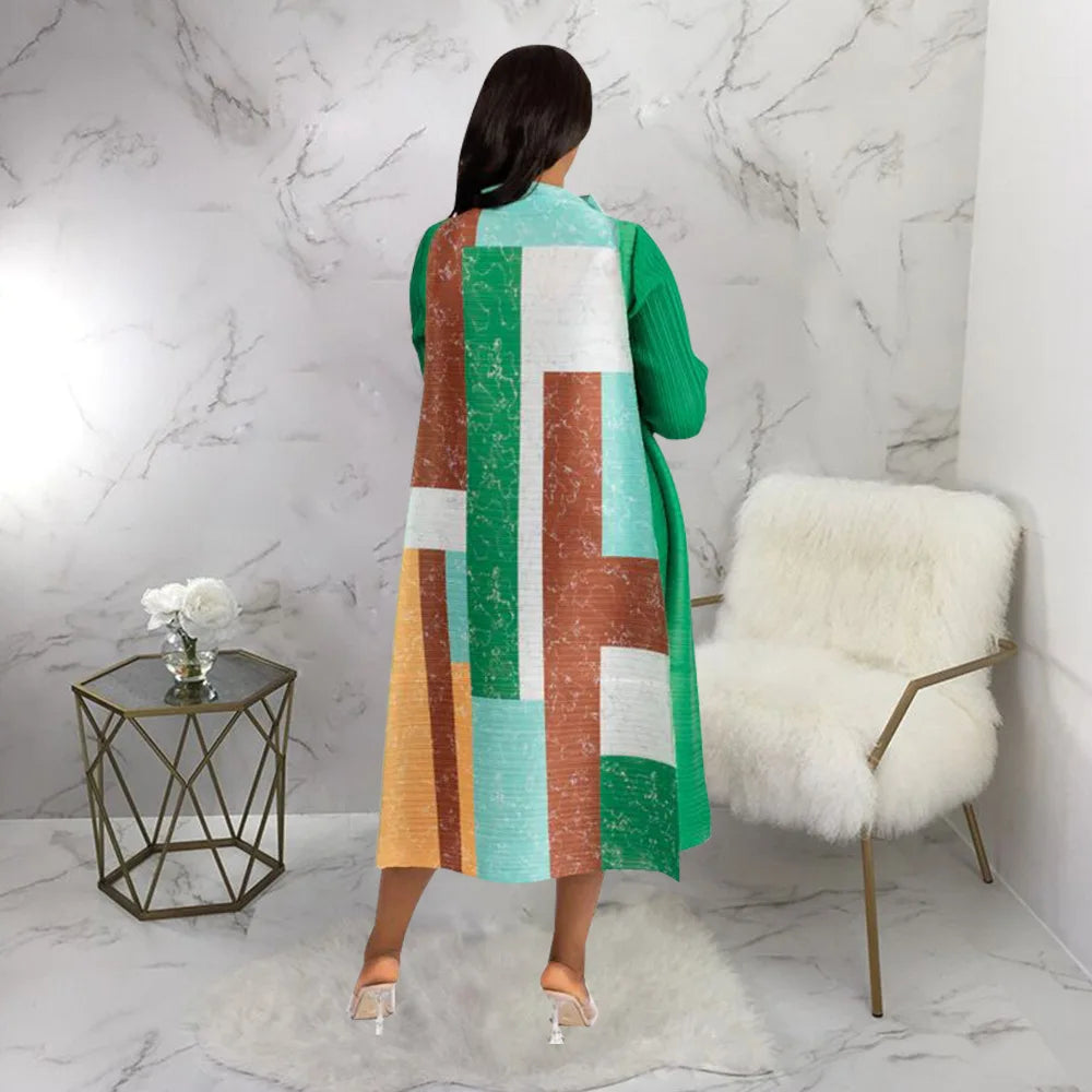 Elegant African Plus Size O-Neck Pleated Long Dress featuring a beautiful traditional Dashiki design, perfect for women seeking stylish and comfortable attire.