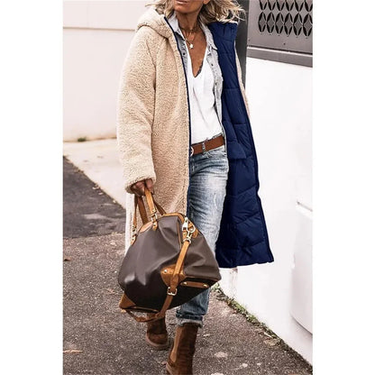 Luxury women's hooded thick quilted long sleeve winter jacket, featuring stylish pockets and a reversible design, perfect for elegant winter wear.