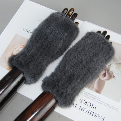 Luxury women's half finger knitted gloves made of 100% real mink fur, perfect for stylish typing.