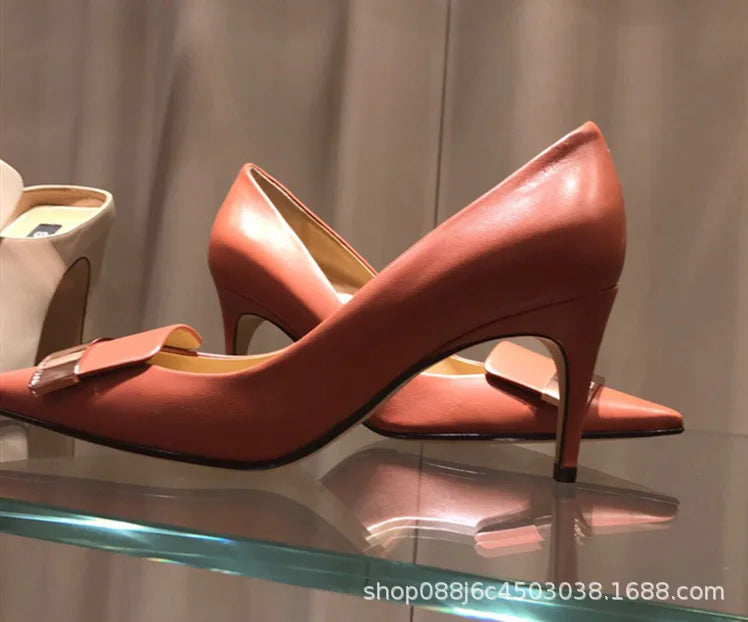 Chic thin heeled pumps in luxury style, ideal for office and career wear, crafted from high-quality bonded leather.