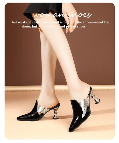 Stylish green high heel mules with a narrow pointed toe and fashionable metal heel, ideal for chic summer ensembles.