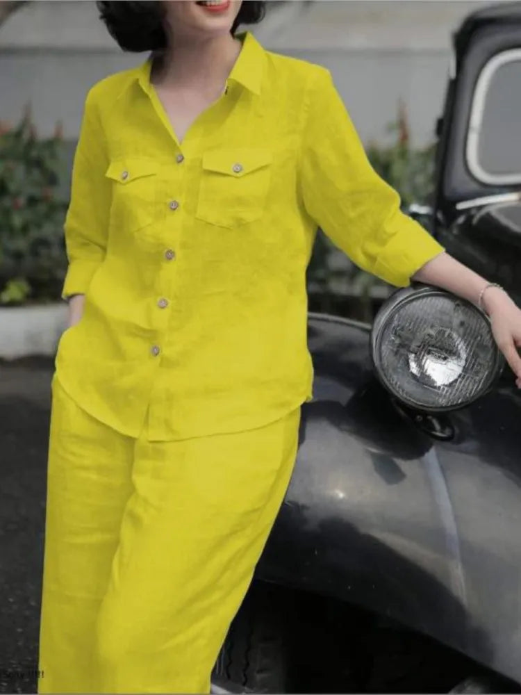 Elegant women's 2-piece lapel neck long sleeve shirt and wide leg pants set in stylish black, perfect for sophisticated casual occasions.