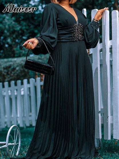 Close-up of the luxurious pearl bead detail on long sleeve Mlaiscsr jumpsuit, offering a perfect blend of glamour and style, designed for refined evening events.